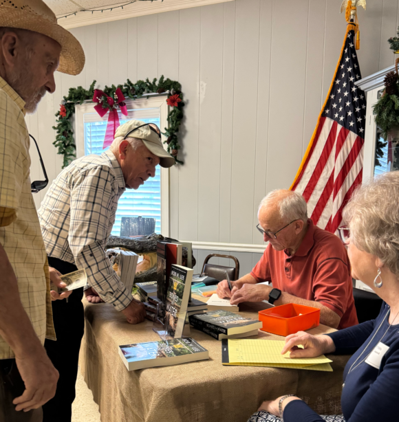 Author, Bob H. Lee, signing books